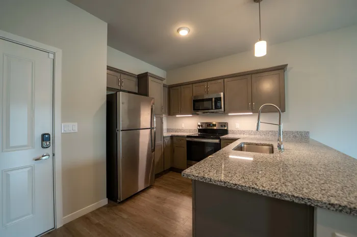 Monarch-Apartments-Springfield-Missouri-One-Bedroom-A-Kitchen-And-Front-Door
