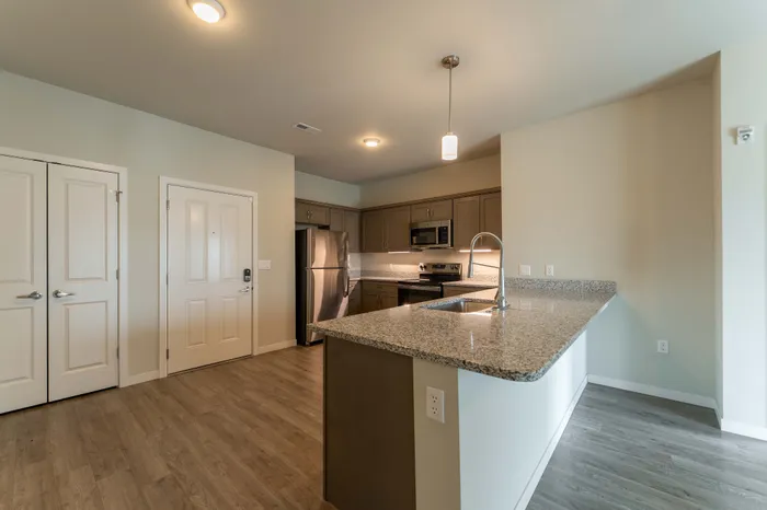 Monarch-Apartments-Springfield-Missouri-Three-Bedroom-A-Kitchen-And-Front-Door