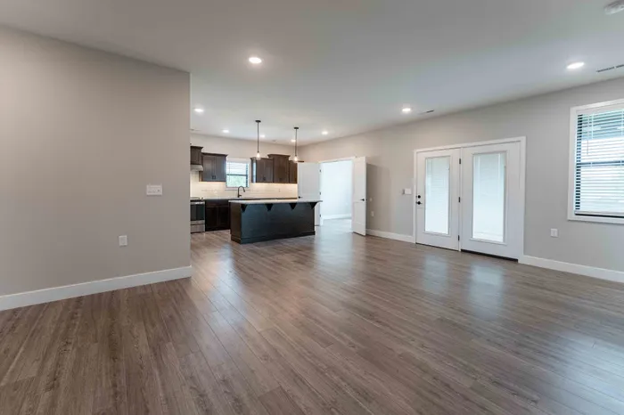 Villas-At-Anthony-Park-55-Plus-South-Springfield-Missouri-Three-Bedroom-Home-Living-Room-Kitchen-Open-Layout