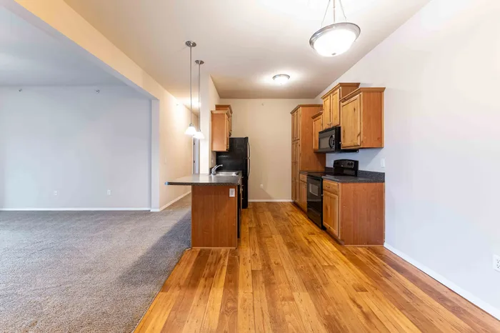 The-Abbey-Apartments-Springfield-Missouri-Three-Bedroom-Deluxe-Kitchen-View-From-Dining-Space