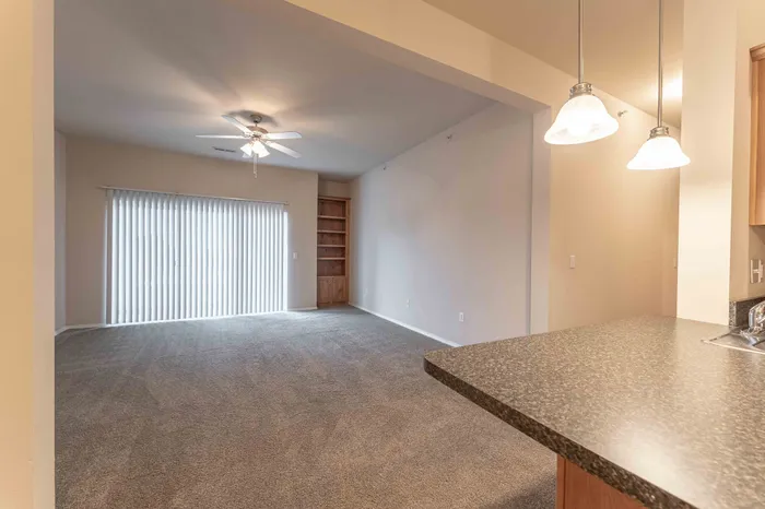 The-Abbey-Apartments-Springfield-Missouri-Three-Bedroom-Deluxe-Living-Room-View-From-Dining