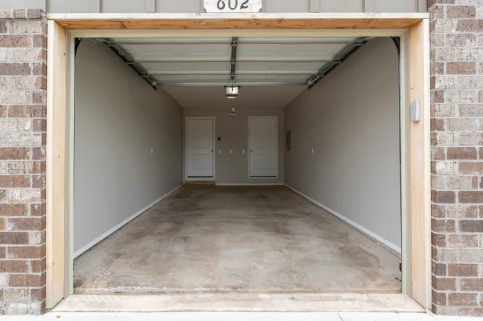 Oakwood-Heights-Townhomes-For-Rent-Republic-Missouri-Phase-2-Three-Bedroom-Unit-602-Garage-View-From-Driveway
