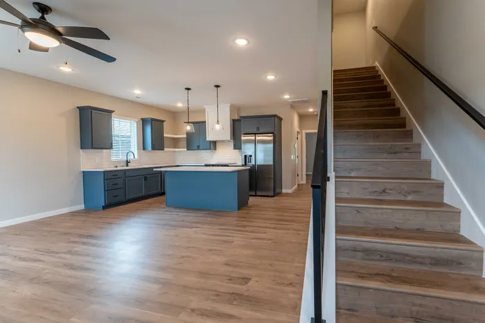 Owen-Silos-Subdivision-Springfield-Missouri-Brooks-Four-Bedroom-Living-Room-And-Staircase-Entrance-View