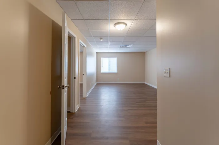 Regency-Towers-Apartments-Rountree-Neighborhood-Springfield-MO-Remodeled-1-Bedroom-Living-Room-Kitchen-View