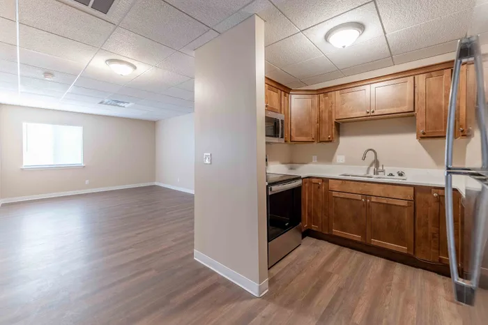 Regency-Towers-Apartments-Rountree-Neighborhood-Springfield-MO-Remodeled-1-Bedroom-Kitchen-To-Living-Room