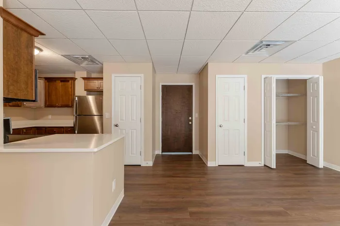 Regency-Towers-Apartments-Rountree-Neighborhood-Springfield-MO-Remodeled-2-Bedroom-Living-Room-To-Front-Entrance