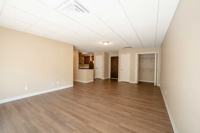Regency-Towers-Apartments-Rountree-Neighborhood-Springfield-MO-Remodeled-2-Bedroom-Living-Room-To-Kitchen