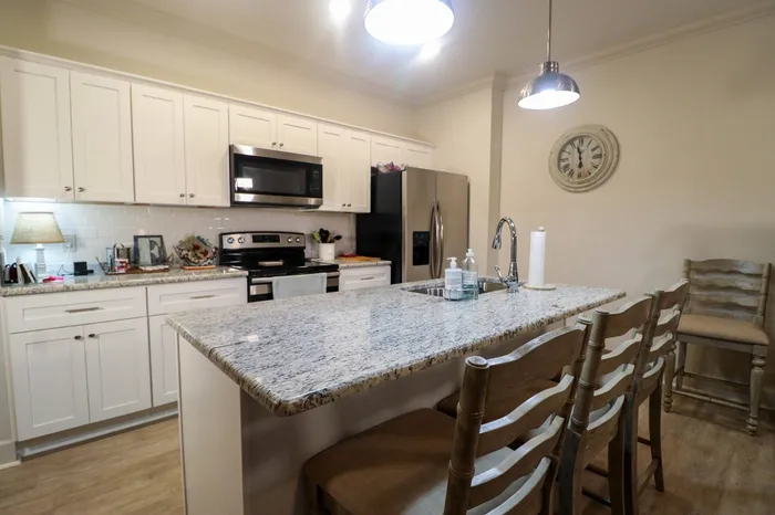 Open Concept Kitchen with Granite Countertops