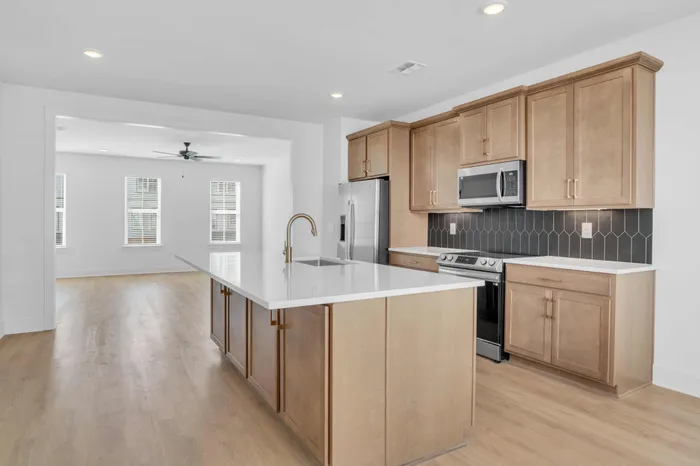 Spacious Kitchen with Modern Finishes and Island