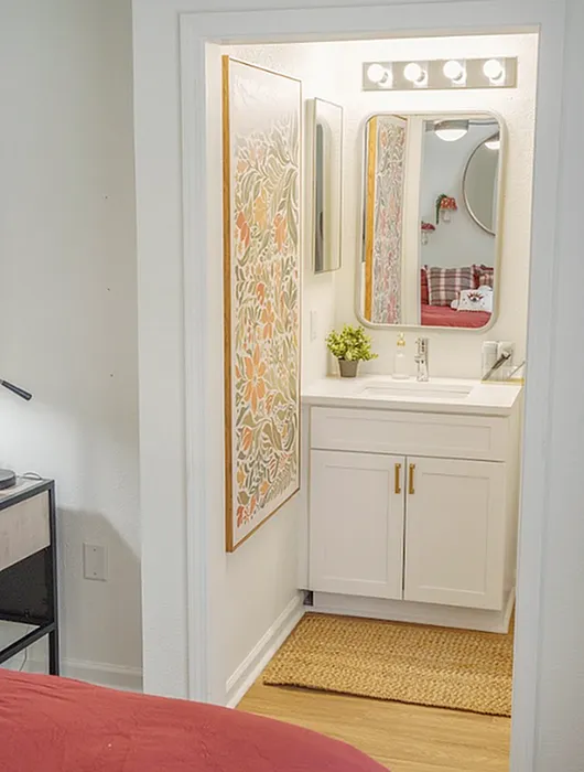 Bathroom vanity and sink inside a student apartment at The Lodge of Athens
