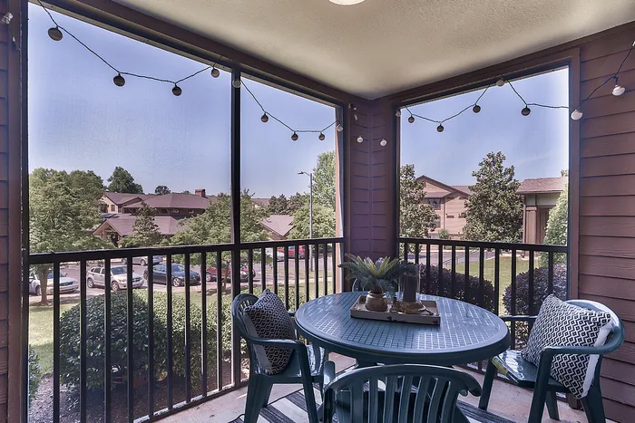 Private balcony with seating at The Lodge of Athens student apartments