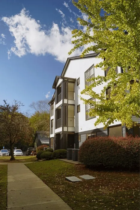 Exterior apartment building at The Lodge of Athens with balconies and landscaping