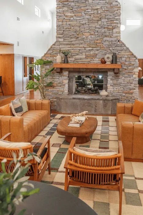 Clubhouse seating area with stone fireplace at The Lodge of Athens