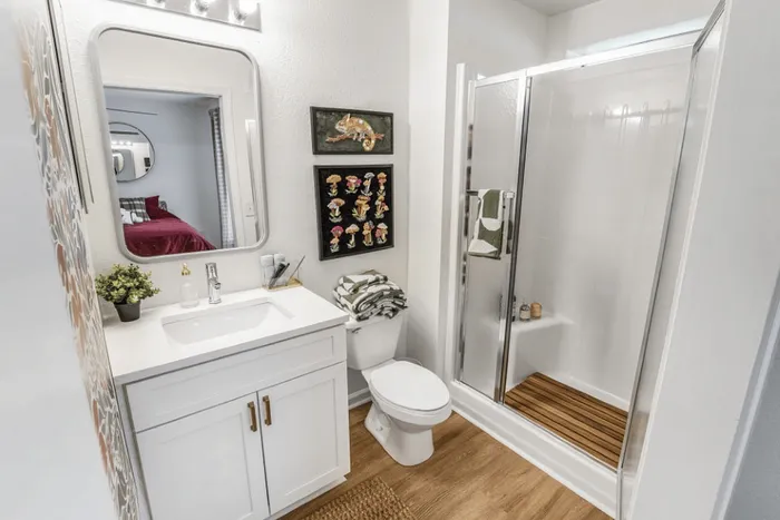 Full bathroom with shower and vanity at The Lodge of Athens student apartments