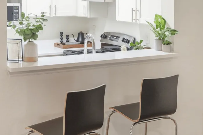 Kitchen breakfast bar with seating at The Lodge of Athens student apartments