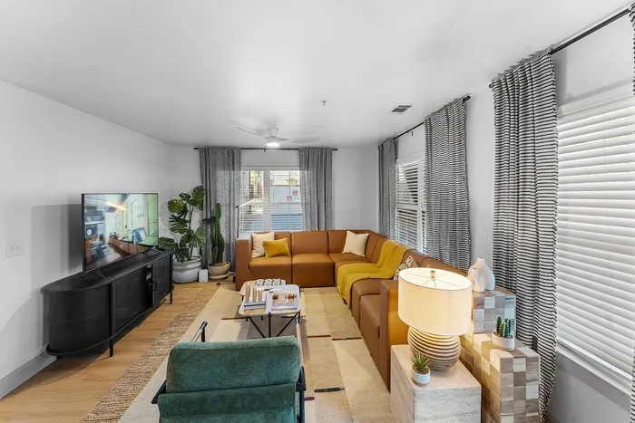 Furnished apartment living room with modern seating at Wildwood Baton Rouge student apartments near LSU