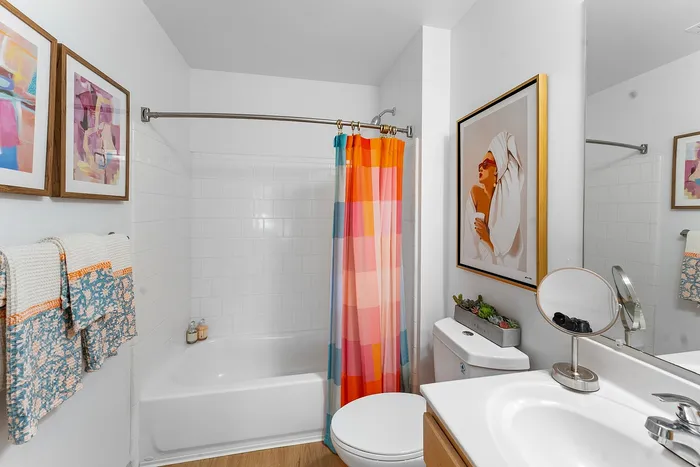 Apartment bathroom with tub and shower at Wildwood Baton Rouge student apartments near LSU