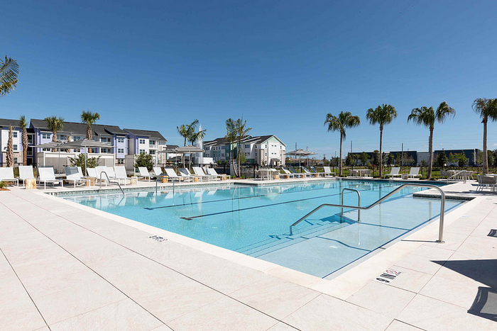 Photos of Lake Nona Concorde apartments in Orlando, FL showcasing modern interiors, luxury amenities, and community spaces