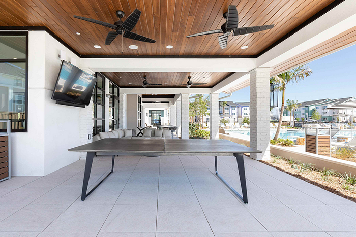 Photos of Lake Nona Concorde apartments in Orlando, FL showcasing modern interiors, luxury amenities, and community spaces