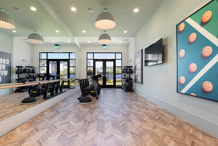 Photos of Lake Nona Concorde apartments in Orlando, FL showcasing modern interiors, luxury amenities, and community spaces
