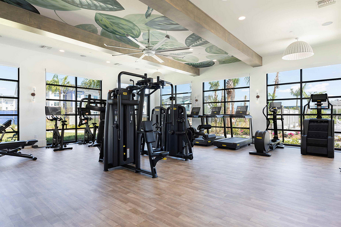 Photos of Lake Nona Concorde apartments in Orlando, FL showcasing modern interiors, luxury amenities, and community spaces