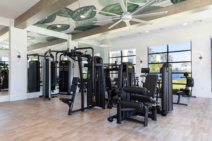 Photos of Lake Nona Concorde apartments in Orlando, FL showcasing modern interiors, luxury amenities, and community spaces