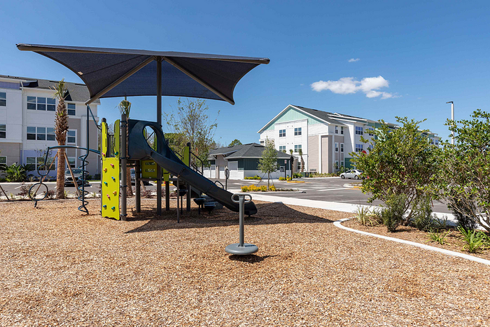 Photos of Lake Nona Concorde apartments in Orlando, FL showcasing modern interiors, luxury amenities, and community spaces