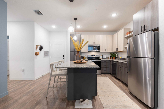 Photos of Lake Nona Concorde apartments in Orlando, FL showcasing modern interiors, luxury amenities, and community spaces
