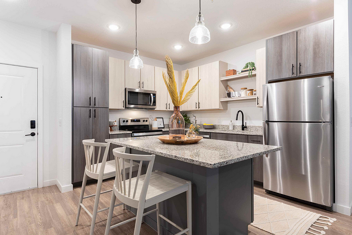 Photos of Lake Nona Concorde apartments in Orlando, FL showcasing modern interiors, luxury amenities, and community spaces