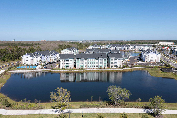 Photos of Lake Nona Concorde apartments in Orlando, FL showcasing modern interiors, luxury amenities, and community spaces