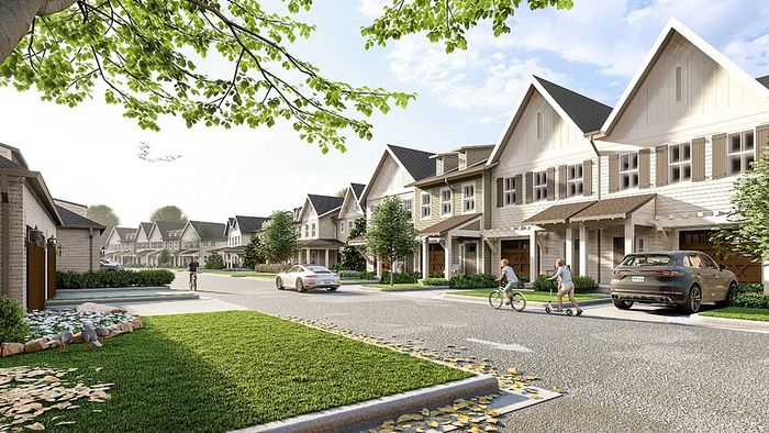 Modern suburban neighborhood with charming row houses, lush green lawns, and a family-friendly street featuring people enjoying outdoor activities.