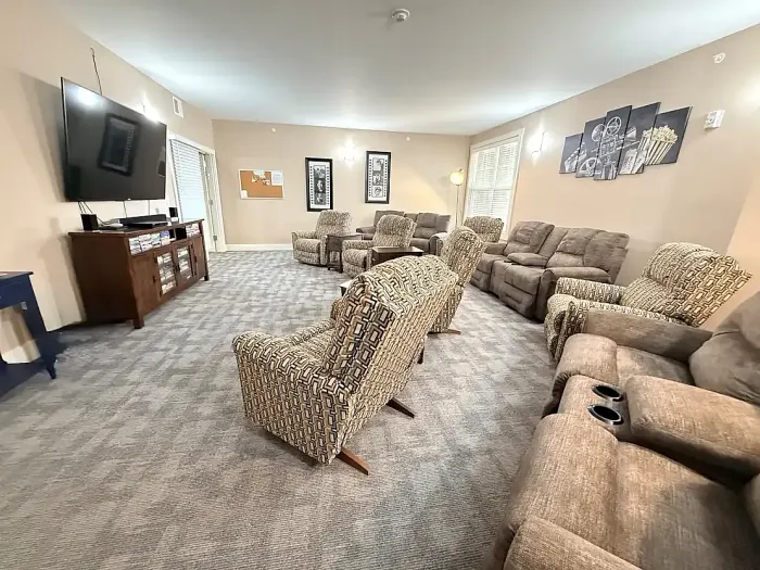 resident lounge with pool table and seating