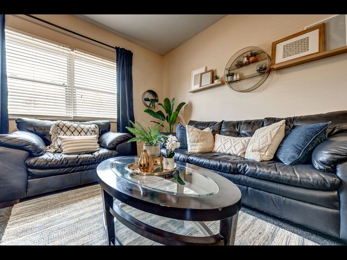 Staged model living room in apartment at University Gate | Erie, PA Apartments.