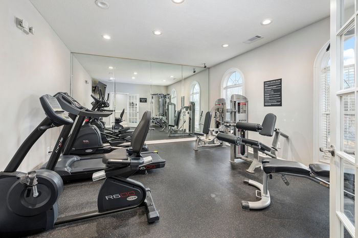 furnished fitness center with equipment