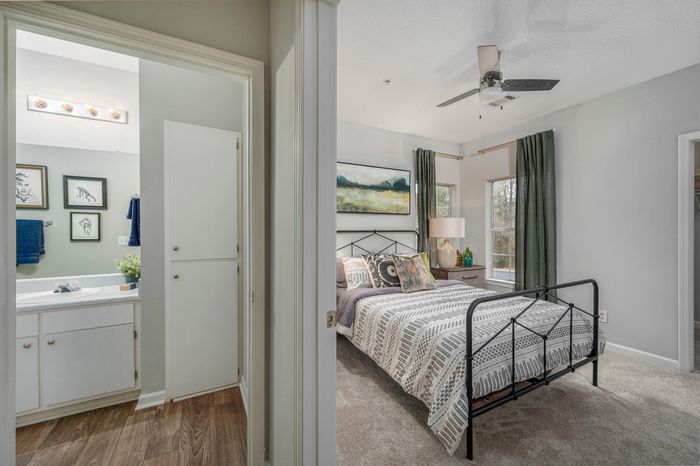 furnished bedroom and bathroom of apartment home