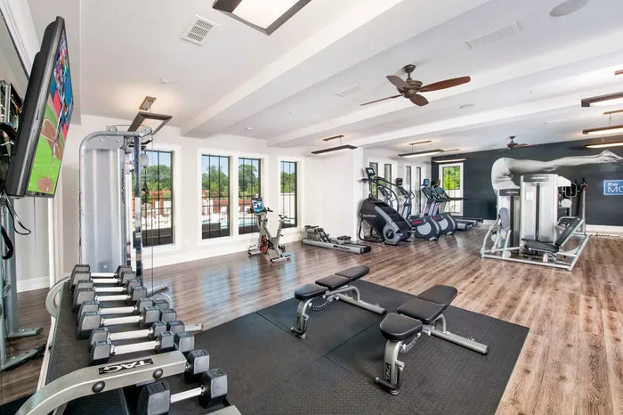 furnished fitness center with equipment
