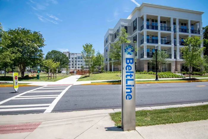 exterior apartment building and crosswalk in daytime