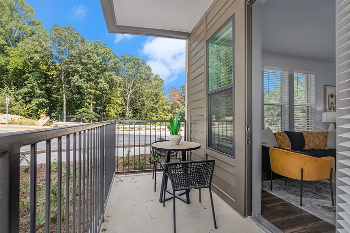 furnished patio area of apartment home on sunny day