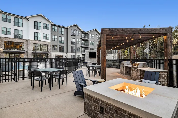 Fire pit with pool and exterior in the background
