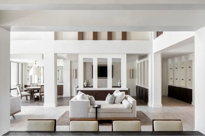 furnished clubroom with sofas