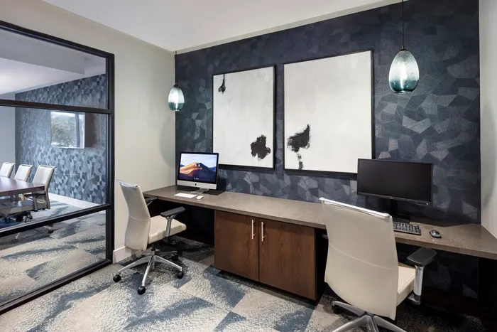 two computers at desk