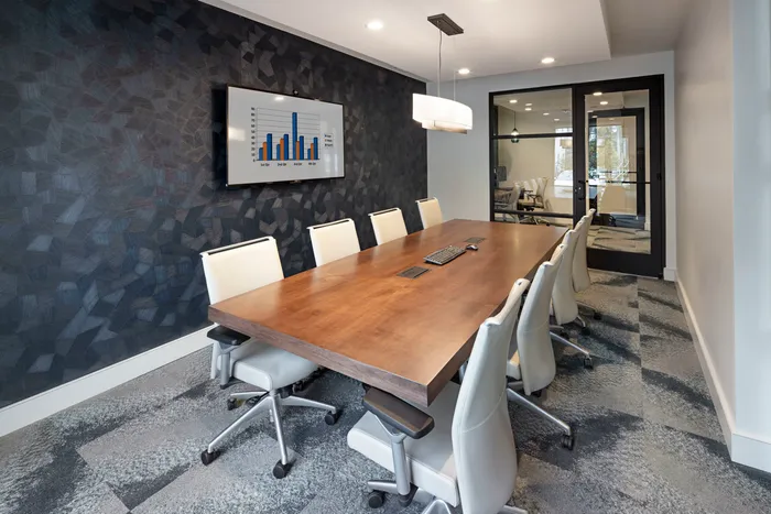 long table with chairs in business center