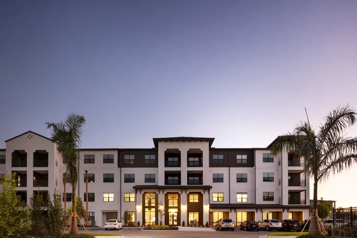apartment building exterior at dusk