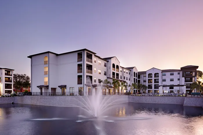 apartment building exterior at dusk