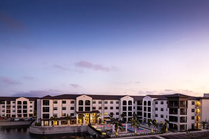 apartment building exterior at dusk