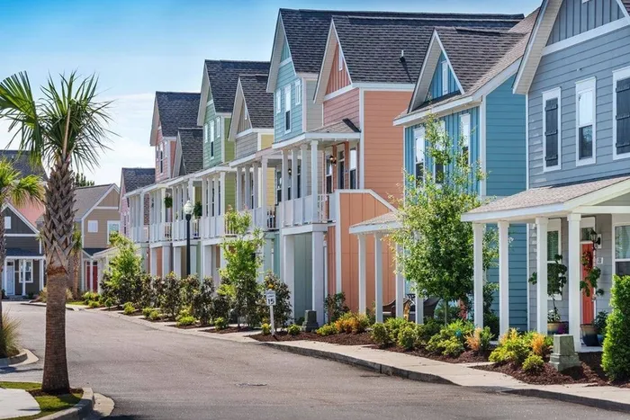 Colorful cottages in a row along a street