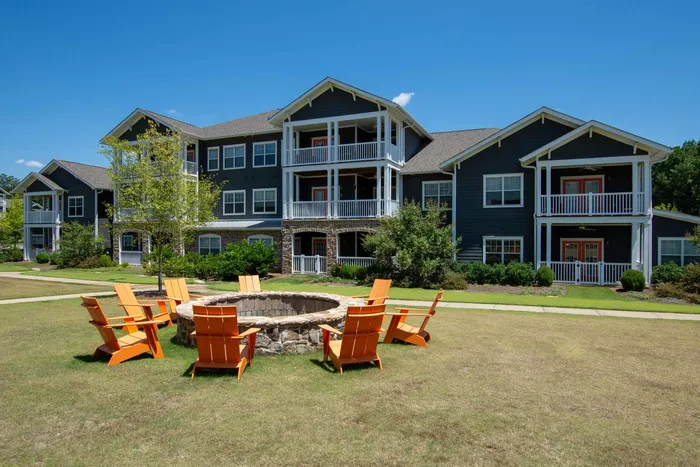 fire pit and apartment building on sunny day