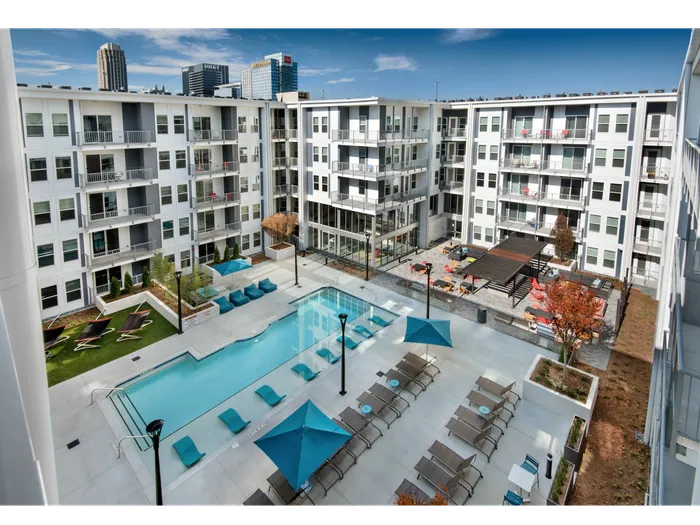 pool and apartment building in daytime