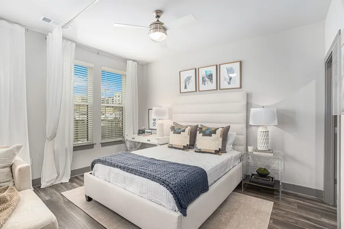 Furnished bedroom with curtain separator