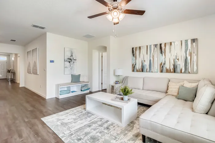 furnished living area with sofa in home